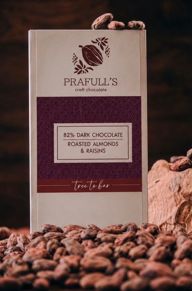 82% Dark Chocolate | Roasted almonds and raisins