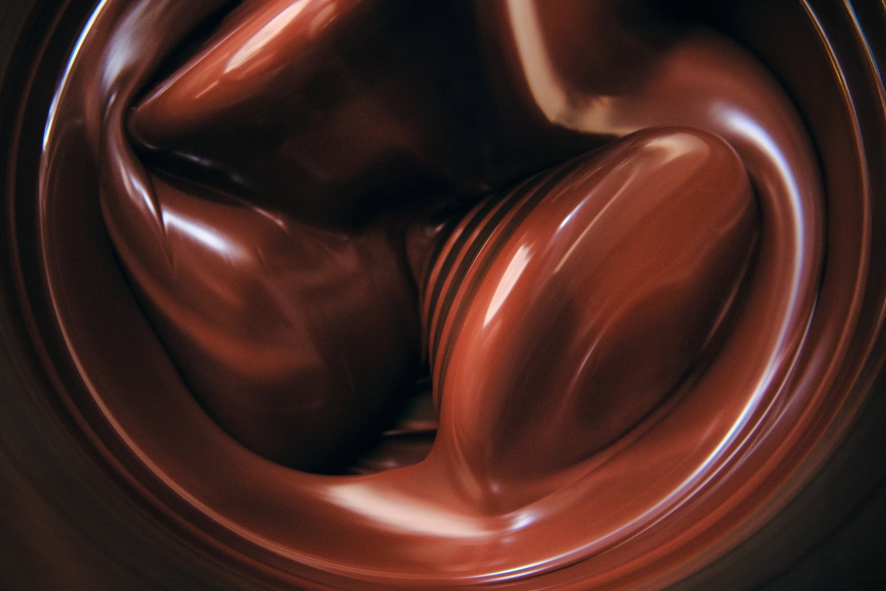 Stone-ground chocolate being conched